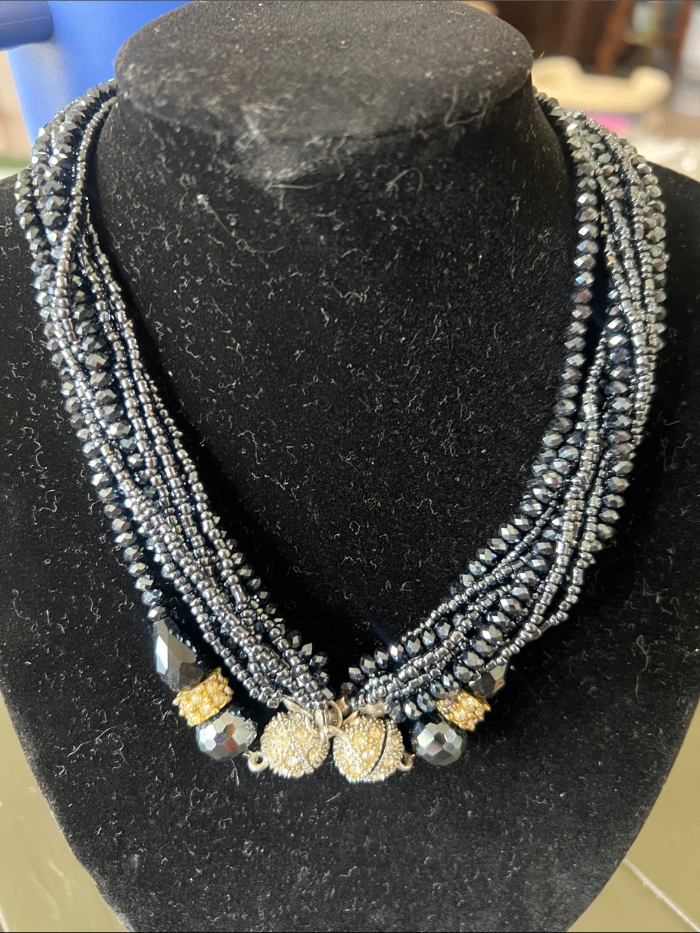 Elegant Black Beaded Multi-Strand Necklace with Gold Accents